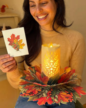 Load image into Gallery viewer, Freshcut Glowing Holiday Candle , Light Up Decor
