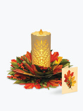 Load image into Gallery viewer, Freshcut Glowing Holiday Candle , Light Up Decor
